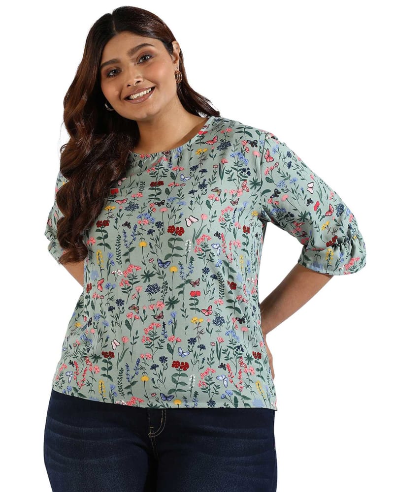 Front of a model wearing a size 6XL Women Floral Design Casual Top in Mint by Instafab Plus. | dia_product_style_image_id:293833